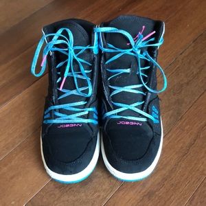 Black, blue, and pink high top Jordan sneakers